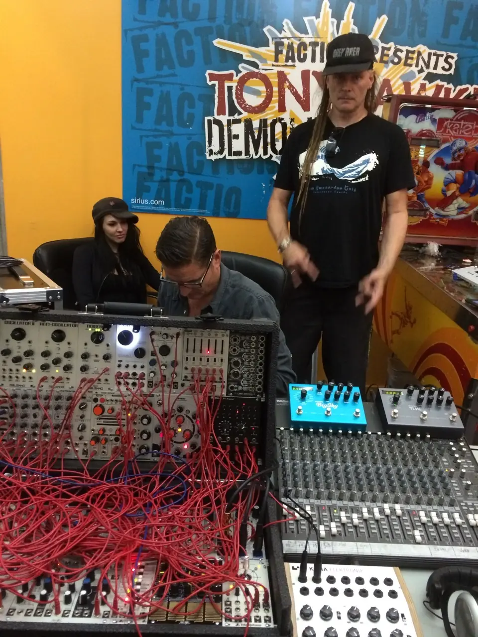 Live on Tony Hawk Radio: a modular rig patched with red cables beside a mixer