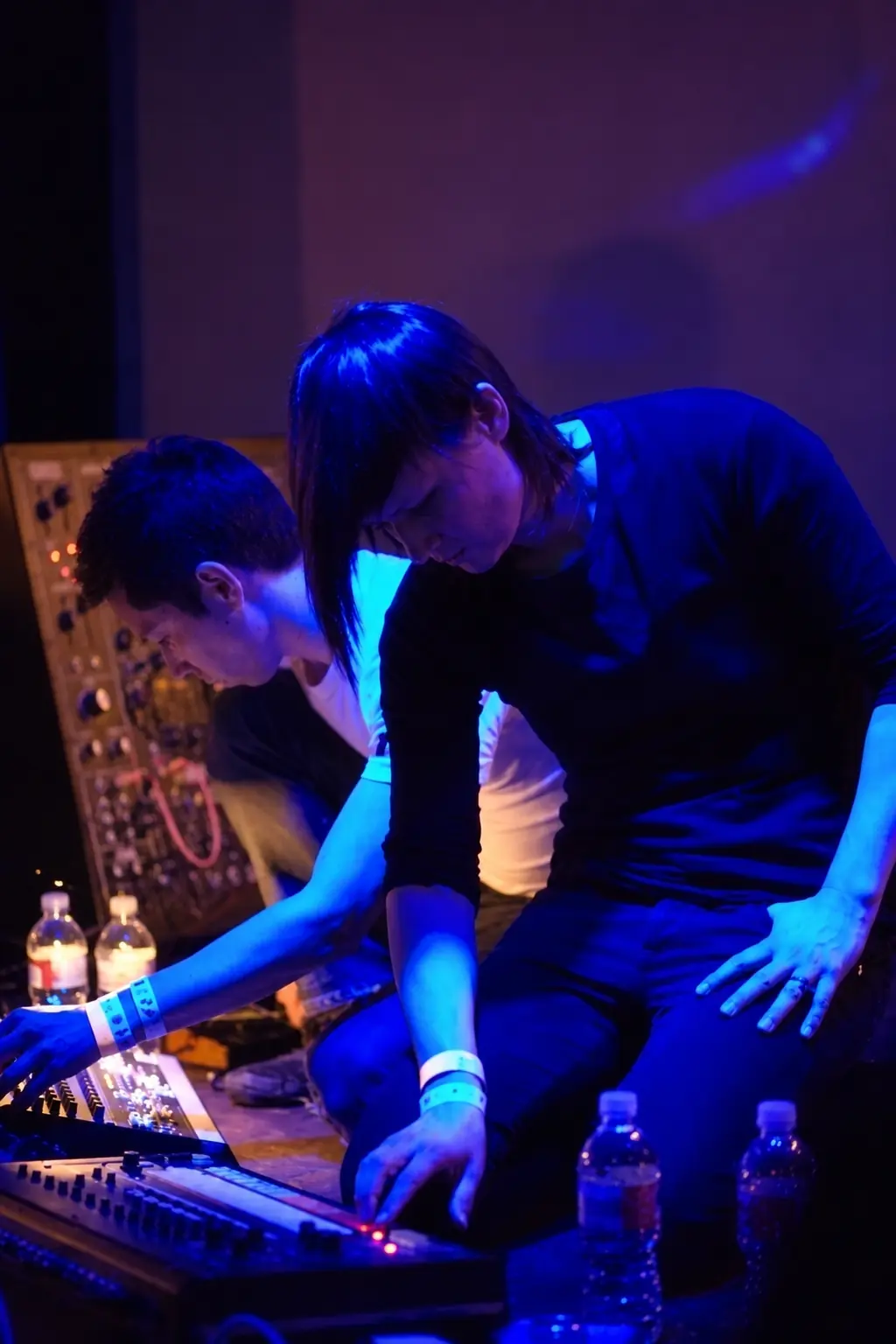 Anon (Anna Sitko) and Cyrusrex at their gear in blue light at the Knitting Factory, Hollywood