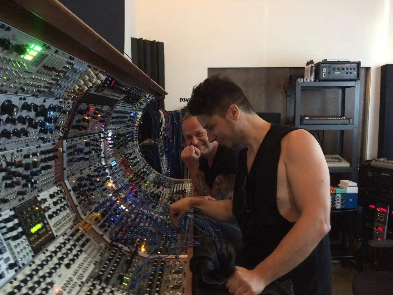 Two men at the big modular in the Los Angeles studio, on Christian Eigner's visit
