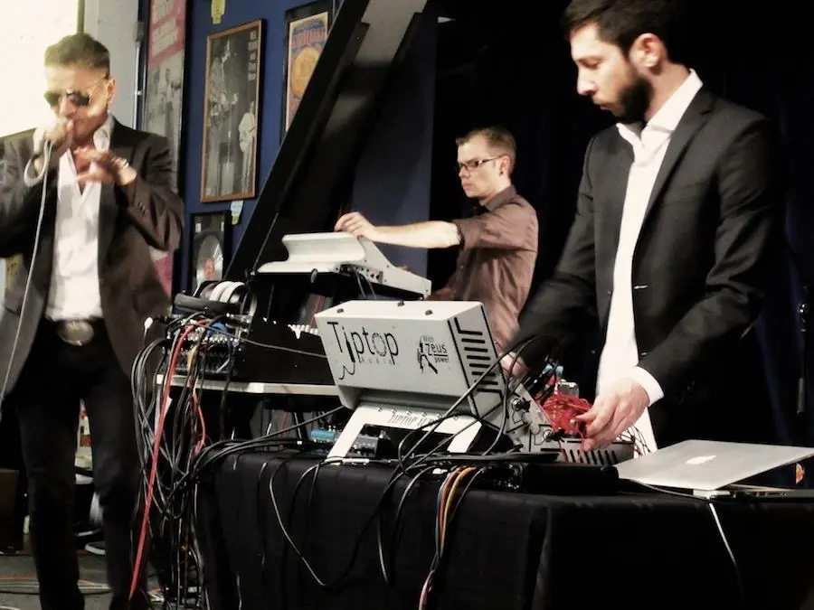 DJMREX live in-store at Amoeba Music in Hollywood: a singer and two players at a table of modular gear
