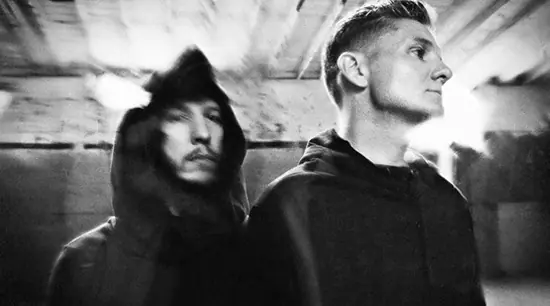 Black and white: DJMREX, Douglas J. McCarthy and Cyrusrex, one in a hood