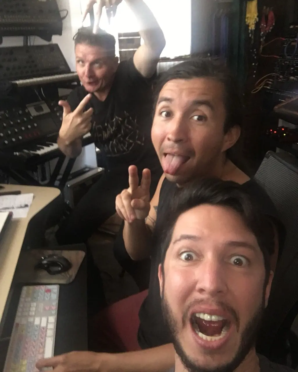 Douglas J. McCarthy, Baseck and Cyrus pulling faces in a studio selfie during the Black Line sessions