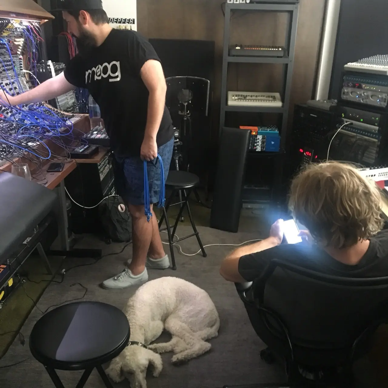 Mark Walk and Brad Apodaca at work in the studio during the Sedition sessions, the studio dog asleep on the floor