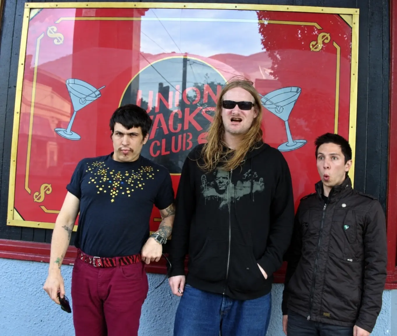 Otto von Schirach, Venetian Snares and Cyrus standing outside a club on tour